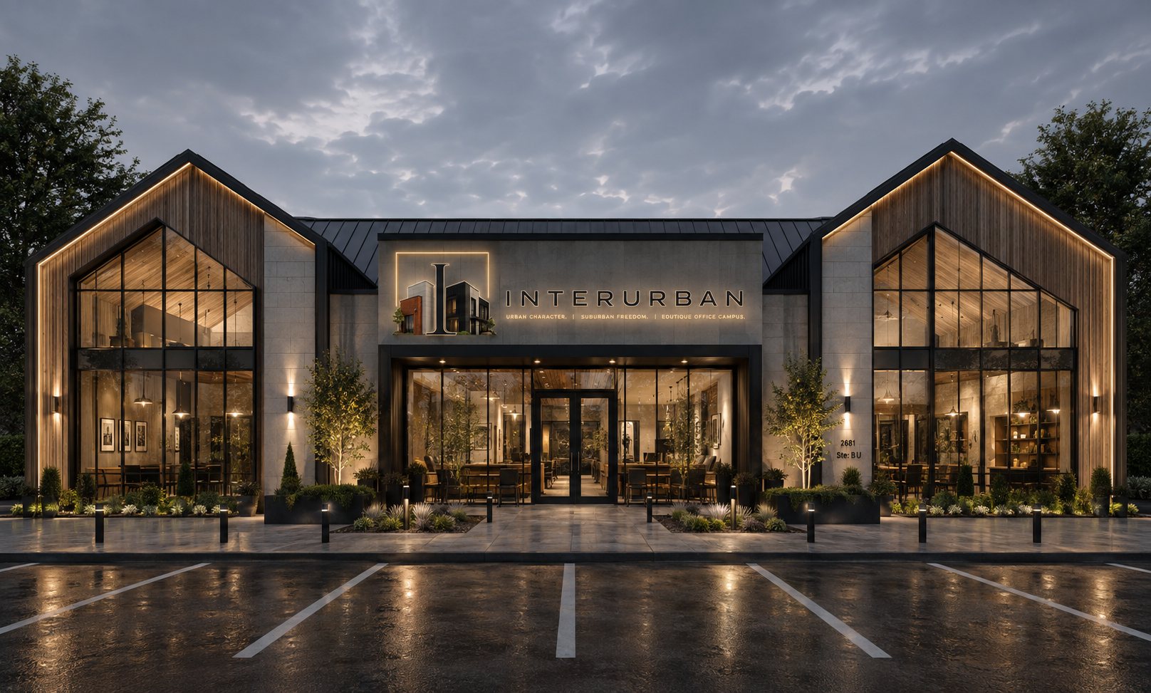 Interurban office building at dusk, gabled facade with warm interior lighting